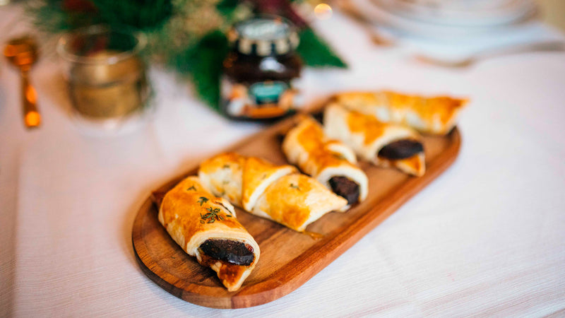 Mini-croissant, boudin noir et confit d’oignons à la bière